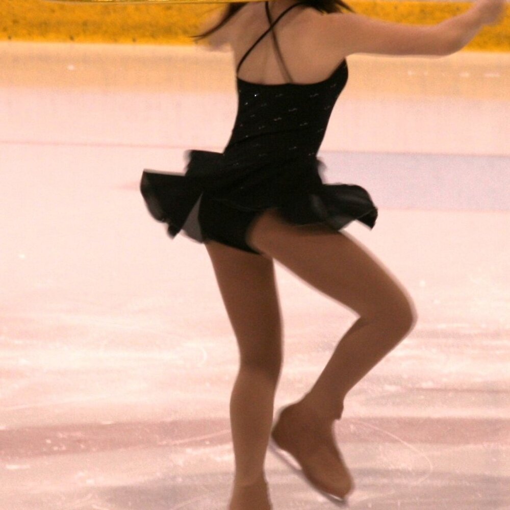 Elegant Black Figure Skating Dress with Rhinestones. Matching hair tie included